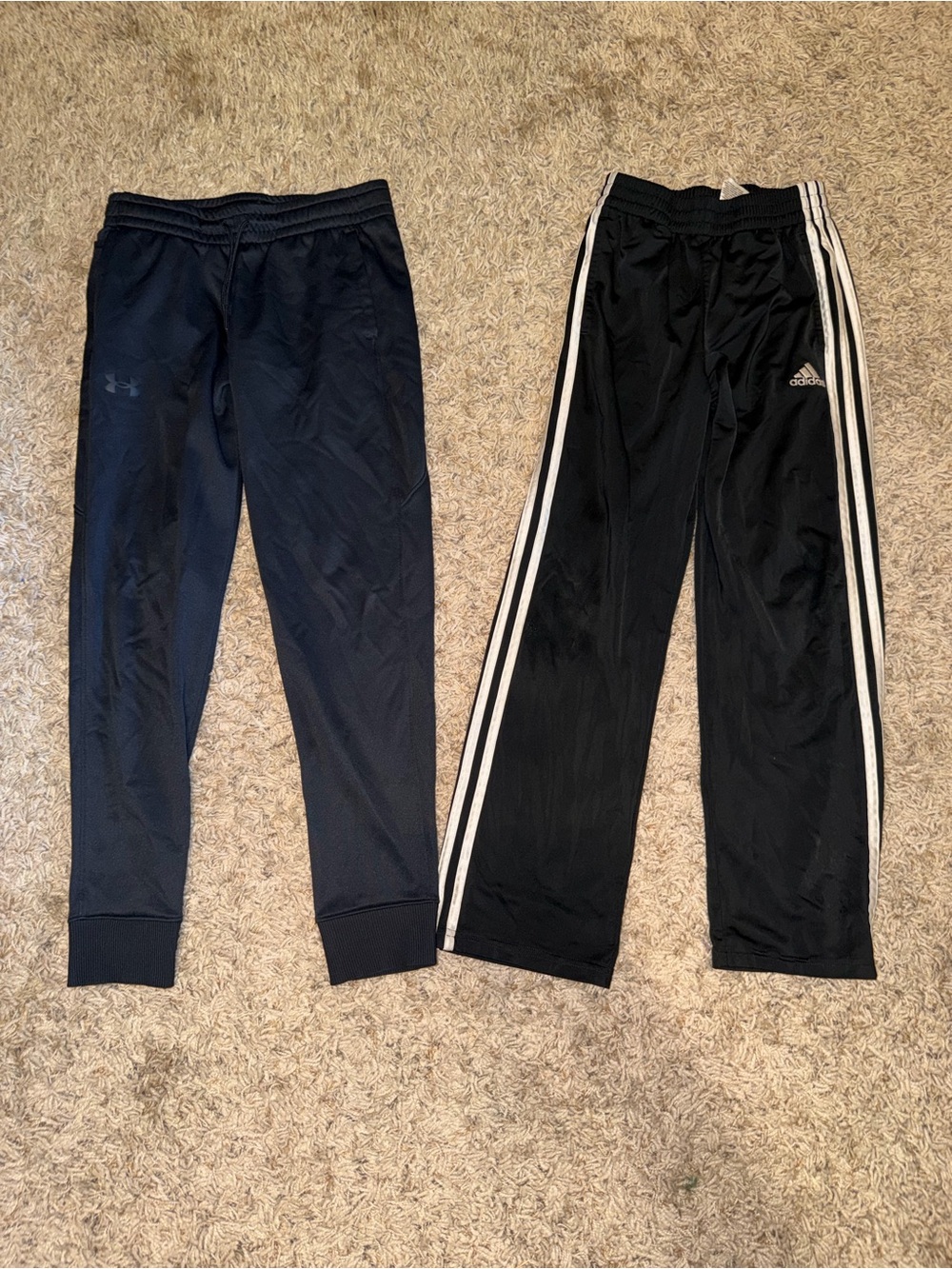 Two pairs of black boys pants athletic wear